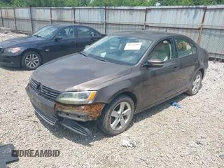 2012 Volkswagen Jetta TDI z VIN 3VWLL7AJ3CM349740, wystawiony jako IAAI lot #42576459 z przebiegiem 135 444 mil mil oraz . Historia ofert i sprzedaży dostępna na DreamBid. Obrazek 2.