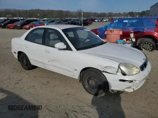 2001 Daewoo Nubira z VIN KLAJC52Z01K711120, wystawiony jako Copart lot #48926575 z przebiegiem 103 375 mil mil oraz Tytuł czysty. Historia ofert i sprzedaży dostępna na DreamBid. Obrazek 4.
