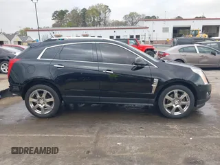 2012 Cadillac SRX Performance Collection with VIN 3GYFNBE39CS556339, listed as a IAAI auction lot 41838058 with 182,244 mi miles and . Bid and sale history available at DreamBid. Image 14.