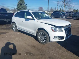 2014 Audi Q5 Premium Plus with VIN WA1LFAFP3EA106931, listed as a IAAI auction lot 41933150 with 140,104 mi miles and . Bid and sale history available at DreamBid. Image 1.