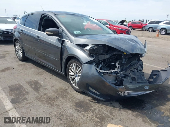 2018 Ford Focus Titanium with VIN 1FADP3N23JL241453, listed as a IAAI auction lot 42025190 with 90,174 mi miles and . Bid and sale history available at DreamBid. Image 1.