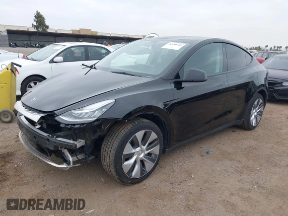 2023 Tesla Model Y Long Range with VIN 7SAYGDEEXPA044335, listed as a IAAI auction lot 42350159 with 26,731 mi miles and . Bid and sale history available at DreamBid. Image 20.