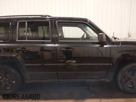 2015 Jeep Patriot Sport z VIN 1C4NJPBA0FD349694, wystawiony jako IAAI lot #42131058 z przebiegiem 126 411 mil mil oraz . Historia ofert i sprzedaży dostępna na DreamBid. Obrazek 13.