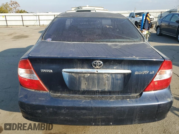 2004 Toyota Camry LE z VIN 4T1BE32K64U329578, wystawiony jako Copart lot #85528744 z przebiegiem Nie podano mil oraz Czysty tytuł • Clean title. Historia ofert i sprzedaży dostępna na DreamBid. Obrazek 6.