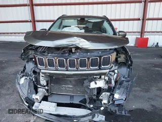 2018 Jeep Compass Altitude with VIN 3C4NJDBB4JT238950, listed as a IAAI auction lot 41815682 with 85,598 mi miles and . Bid and sale history available at DreamBid. Image 6.