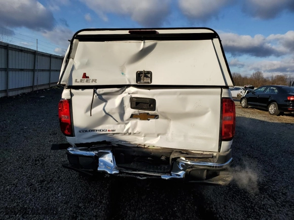 2020 Chevrolet Colorado 4WD Work Truck with VIN 1GCGTBEN9L1222959, listed as a Copart auction lot 83434044 with 103,920 mi miles and Salvage Title. Bid and sale history available at carsss.com. Image 6.
