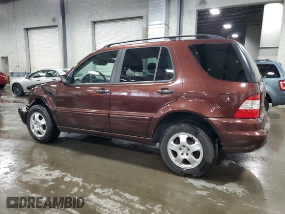 2002 Mercedes-Benz M-Class with VIN 4JGAB75E72A323840, listed as a Copart auction lot 75729384 with 122,811 mi miles and Salvage Title. Bid and sale history available at carsss.com. Image 2.