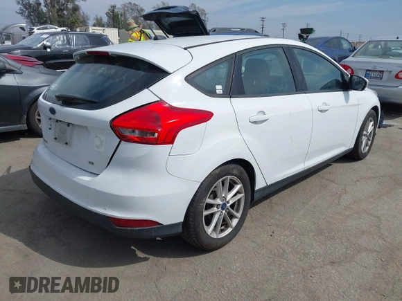2015 Ford Focus SE with VIN 1FADP3K22FL315960, listed as a IAAI auction lot 41968426 with 184,726 mi miles. Bid and sale history available at carsss.com. Image 4.