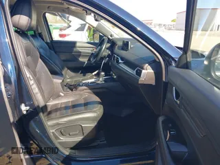 2018 Mazda CX-5 Grand Touring with VIN JM3KFADM1J0322049, listed as a IAAI auction lot 41891079 with 174,939 mi miles and . Bid and sale history available at DreamBid. Image 5.