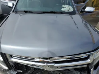2020 Chevrolet Suburban Premier with VIN 1GNSCJKC3LR140399, listed as a Copart auction lot 77262944 with 69,901 mi miles and Salvage Title. Bid and sale history available at carsss.com. Image 12.