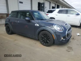 2015 MINI Hardtop S with VIN WMWXP7C59F2A34428, listed as a Copart auction lot 50697285 with 131,564 mi miles and Salvage Title. Bid and sale history available at DreamBid. Image 4.
