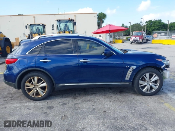 2015 Infiniti QX70 с VIN JN8CS1MU2FM380734, выставлен на аукционе IAAI как лот 42723003 с пробегом 175 469 миль миль и . История ставок и продаж доступна на DreamBid. Изображение 13.