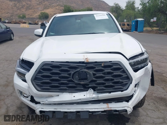 2023 Toyota Tacoma SR with VIN 3TMCZ5AN1PM556299, listed as a IAAI auction lot 42344160 with 42,338 mi miles and . Bid and sale history available at DreamBid. Image 13.
