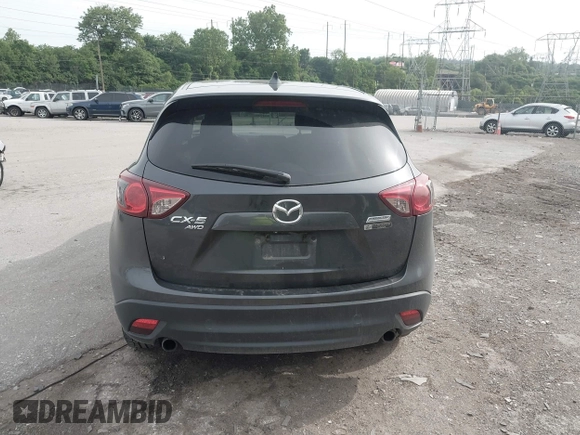 2014 Mazda CX-5 Touring z VIN JM3KE4CY2E0348500, wystawiony jako IAAI lot #42318155 z przebiegiem 182 616 mil mil oraz . Historia ofert i sprzedaży dostępna na DreamBid. Obrazek 16.