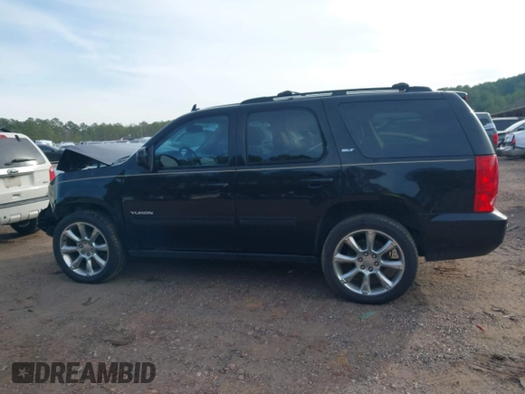 2012 GMC Yukon SLT with VIN 1GKS1CE06CR104447, listed as a IAAI auction lot 41589823 with 183,003 mi miles. Bid and sale history available at carsss.com. Image 14.