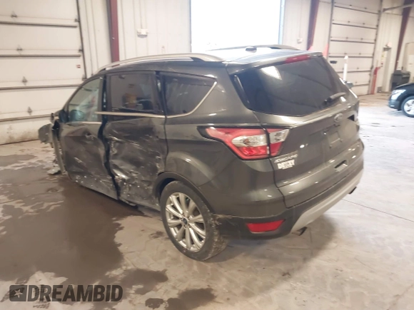 2017 Ford Escape Titanium with VIN 1FMCU9JD7HUE46427, listed as a IAAI auction lot 41808083 with 55,201 mi miles. Bid and sale history available at carsss.com. Image 3.