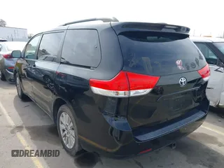 2012 Toyota Sienna LE with VIN 5TDJK3DC0CS037989, listed as a IAAI auction lot 41622546 with 165,363 mi miles. Bid and sale history available at carsss.com. Image 3.