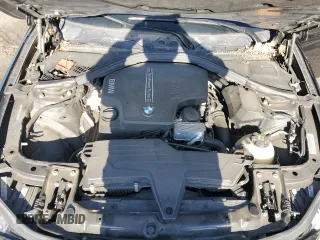 2015 BMW 3 Series 328i xDrive with VIN WBA3B3C59FJ985091, listed as a Copart auction lot 57658705 with 106,521 mi miles and Salvage title. Bid and sale history available at DreamBid. Image 11.
