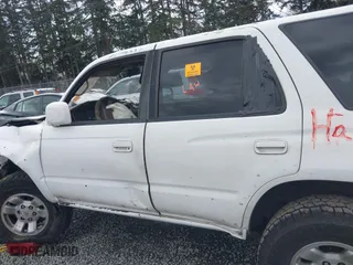 1998 Toyota 4Runner Limited with VIN JT3HN87R4W0167059, listed as a IAAI auction lot 41954926 with 304,536 mi miles. Bid and sale history available at carsss.com. Image 14.
