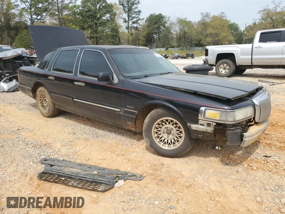 1997 Lincoln Town Car Executive z VIN 1LNLM81W6VY675388, wystawiony jako Copart lot #50345165 z przebiegiem 164 206 mil mil oraz Szkoda całkowita • Salvage title. Historia ofert i sprzedaży dostępna na DreamBid. Obrazek 4.