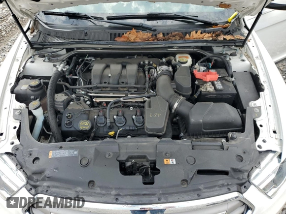 2016 Ford Taurus SEL with VIN 1FAHP2E84GG112803, listed as a Copart auction lot 54372645 with 79,999 mi miles and Salvage Title. Bid and sale history available at DreamBid. Image 11.