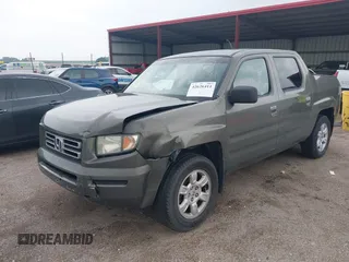 2007 Honda Ridgeline RTL with VIN 2HJYK16517H513832, listed as a IAAI auction lot 42626411 with 209,171 mi miles and . Bid and sale history available at DreamBid. Image 2.