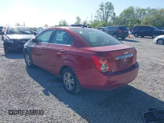 2013 Chevrolet Sonic LT with VIN 1G1JC5SH3D4256507, listed as a IAAI auction lot 42235009 with 117,804 mi miles and . Bid and sale history available at DreamBid. Image 3.