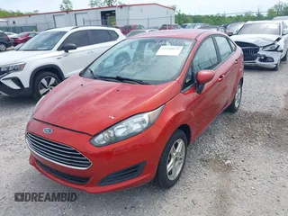 2018 Ford Fiesta SE z VIN 3FADP4BJ1JM132084, wystawiony jako IAAI lot #42296074 z przebiegiem 62 852 mil mil oraz . Historia ofert i sprzedaży dostępna na DreamBid. Obrazek 6.