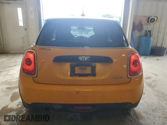 2017 MINI Hardtop Cooper with VIN WMWXP5C37H2D17030, listed as a Copart auction lot 54658275 with 144,308 mi miles and Salvage title. Bid and sale history available at DreamBid. Image 6.