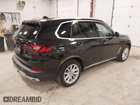 2023 BMW X5 xDrive40i with VIN 5UXCR6C08P9R88991, listed as a IAAI auction lot 41965881 with 33,136 mi miles. Bid and sale history available at carsss.com. Image 4.