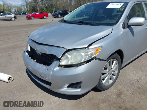 2009 Toyota Corolla with VIN 2T1BU40E69C142856, listed as a IAAI auction lot 42045414 with 238,154 mi miles. Bid and sale history available at carsss.com. Image 6.