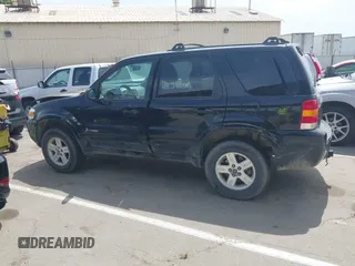 2006 Ford Escape Hybrid z VIN 1FMCU96H96KA25975, wystawiony jako IAAI lot #42130554 z przebiegiem 235 342 mil mil oraz . Historia ofert i sprzedaży dostępna na DreamBid. Obrazek 14.