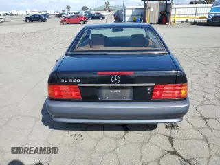 1994 Mercedes-Benz SL with VIN WDBFA63E1RF100599, listed as a Copart auction lot 51619785 with 111,720 mi miles and Clean title. Bid and sale history available at DreamBid. Image 6.
