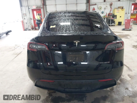 2023 Tesla Model Y Long Range with VIN 7SAYGDEE2PF808844, listed as a IAAI auction lot 41941905 with 39,951 mi miles and . Bid and sale history available at carsss.com. Image 17.