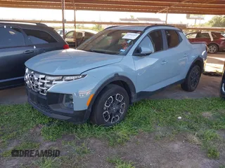 2022 Hyundai Santa Cruz SEL Premium z VIN 5NTJDDAF3NH012433, wystawiony jako IAAI lot #41922462 z przebiegiem 72 880 mil mil oraz . Historia ofert i sprzedaży dostępna na DreamBid. Obrazek 2.