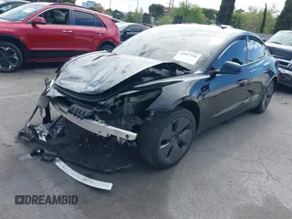2022 Tesla Model 3 with VIN 5YJ3E1EA7NF314744, listed as a IAAI auction lot 42057596 with 30,936 mi miles and . Bid and sale history available at DreamBid. Image 2.