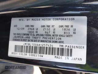 2010 Mazda 3 i Touring with VIN JM1BL1SG6A1257434, listed as a IAAI auction lot 42137490 with 128,268 mi miles and . Bid and sale history available at carsss.com. Image 9.