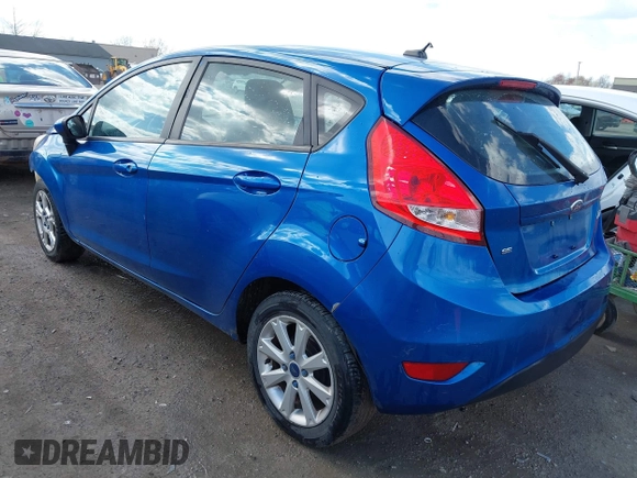 2011 Ford Fiesta SE with VIN 3FADP4EJ0BM173576, listed as a IAAI auction lot 42075691 with 128,835 mi miles. Bid and sale history available at carsss.com. Image 3.