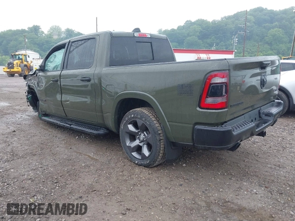 2021 Ram 1500 Lone Star with VIN 1C6SRFFT6MN695393, listed as a IAAI auction lot 42344282 with 12,796 mi miles and . Bid and sale history available at DreamBid. Image 3.