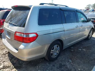 2005 Honda Odyssey EX-L with VIN 5FNRL38795B115738, listed as a IAAI auction lot 41789669 with 292,926 mi miles. Bid and sale history available at carsss.com. Image 4.