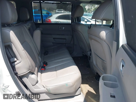 2013 Honda Pilot Touring with VIN 5FNYF3H93DB017954, listed as a IAAI auction lot 42185556 with 174,929 mi miles and . Bid and sale history available at carsss.com. Image 8.