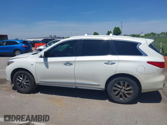 2015 Infiniti QX60 with VIN 5N1AL0MM2FC540784, listed as a IAAI auction lot 42226443 with 108,638 mi miles and . Bid and sale history available at DreamBid. Image 14.