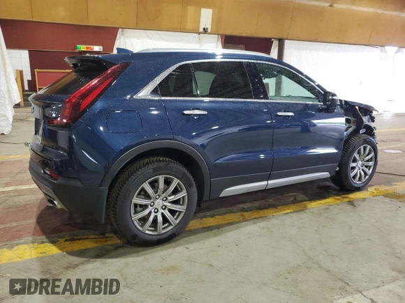 2021 Cadillac XT4 AWD Premium Luxury with VIN 1GYFZDR41MF031543, listed as a Copart auction lot 61085805 with 21,318 mi miles and Salvage title. Bid and sale history available at DreamBid. Image 3.