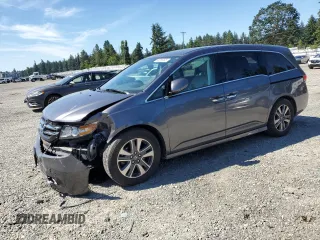 2016 Honda Odyssey Touring Elite with VIN 5FNRL5H94GB060230, listed as a Copart auction lot 63266995 with 107,227 mi miles and Salvage title. Bid and sale history available at DreamBid. Image 1.
