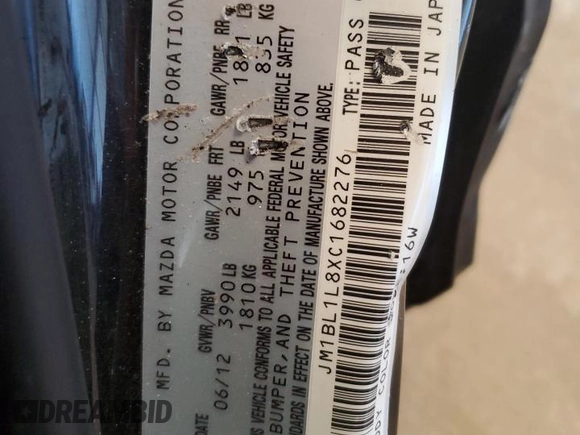 2012 Mazda 3 i Touring with VIN JM1BL1L8XC1682276, listed as a Copart auction lot 59992805 with 156,944 mi miles and Salvage title. Bid and sale history available at DreamBid. Image 12.