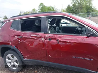 2021 Jeep Compass Latitude with VIN 3C4NJDBBXMT504993, listed as a IAAI auction lot 42181872 with 56,053 mi miles and . Bid and sale history available at DreamBid. Image 6.