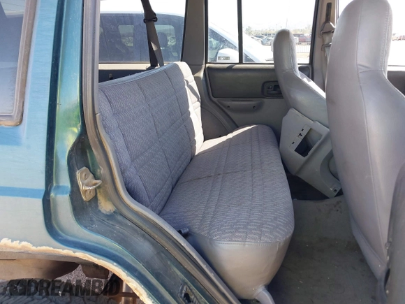 1997 Jeep Cherokee Sport with VIN 1J4FJ68S4VL592390, listed as a IAAI auction lot 41682369 with 194,624 mi miles. Bid and sale history available at carsss.com. Image 8.