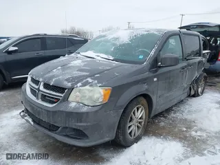 2014 Dodge Grand Caravan SE with VIN 2C4RDGBG8ER470014, listed as a IAAI auction lot 41553310 with 147,657 mi miles. Bid and sale history available at carsss.com. Image 16.