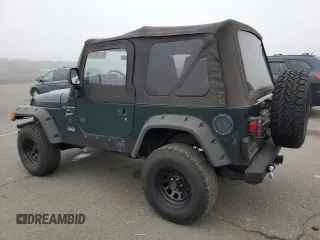 1999 Jeep Wrangler Sport z VIN 1J4FY19SXXP427968, wystawiony jako Copart lot #50102855 z przebiegiem 174 381 mil mil oraz Czysty tytuł • Clean title. Historia ofert i sprzedaży dostępna na DreamBid. Obrazek 2.