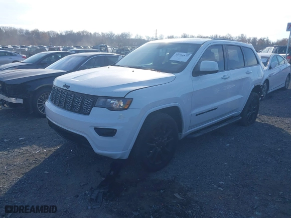 2021 Jeep Grand Cherokee Laredo X with VIN 1C4RJFAGXMC589548, listed as a IAAI auction lot 40794875 with 85,680 mi miles. Bid and sale history available at carsss.com. Image 17.